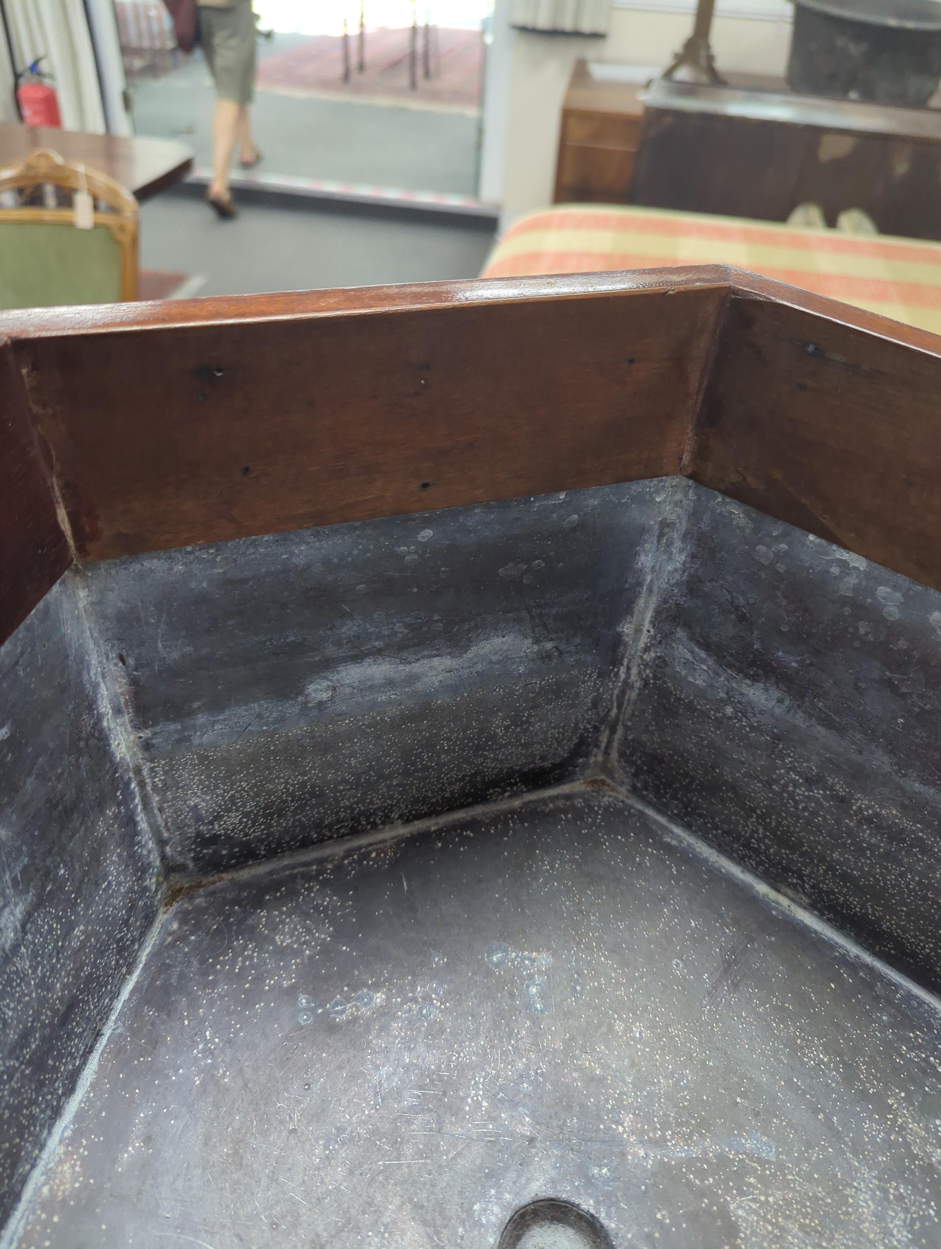 A George III hexagonal brass-bound wine cooler, width 48cm, height 66cm
